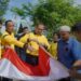 Sambut HUT RI ke 77, Kapolres Lhokseumawe Kibarkan Bendera Merah Putih Serentak Bersama Warga