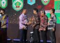 Pj. Walikota Lhokseumawe Terima Penghargaan UHC Awards 2023 dari Wapres RI