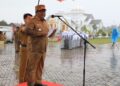 Diguyur Hujan Lebat, Upacara HKN Tetap Khidmat di Aceh Utara