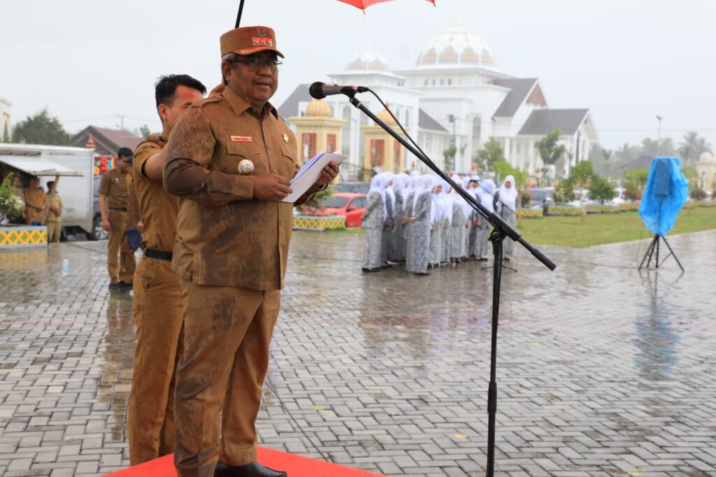 Diguyur Hujan Lebat, Upacara HKN Tetap Khidmat di Aceh Utara