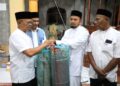 Pemkab Aceh Utara Serahkan Santunan Anak Yatim dan Bantuan Sajadah di Mesjid Jamik Attaqwa